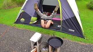 Strong shoes hoisted in the air to dump steamy piss at the campsite