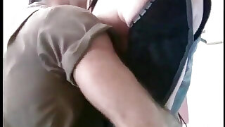 Hot dude in leather gear sucks his partner's dick on his knees