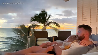 Sunset Rendezvous turns into Sans a condom Muscle Breeding Balcony Fuckfest