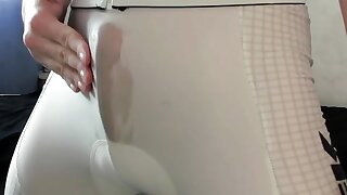 Cute twink plays with his cock and caboose in cock-squeezing cycling suit